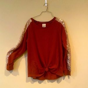 Grace & Emma rust-burgundy top with sequined stripe down sleeves. Size M